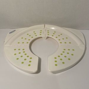 Gracie Travel folding potty. never used on the go flips open. Carrying case